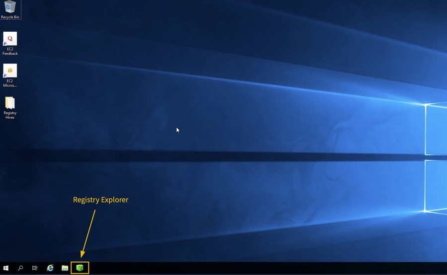 Windows Desktop screenshot highlighting the location of Registry Explorer tool in the taskbar.
